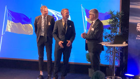 Jens Holm, Andreas Carlson och Andrii Plakhotniuk på scenen