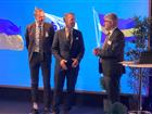 Jens Holm, Andreas Carlson och Andrii Plakhotniuk på scenen